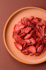 Dried sublimated slices of strawberry as an ingredient for sweet desserts. Dried strawberry