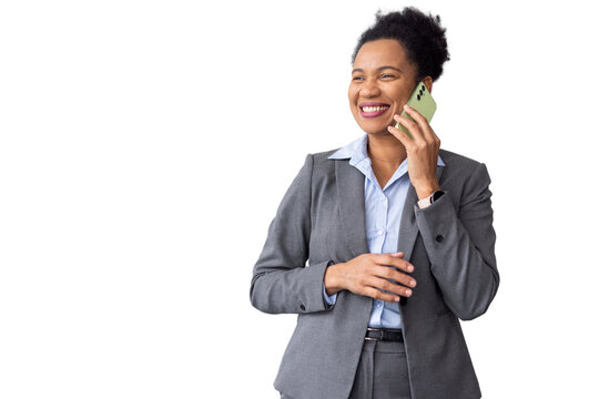 Professional businesswoman talking on smartphone, wearing tailored suit against transparent backdrop
