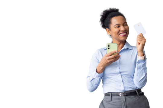Happy businesswoman using her smartphone and credit card for online shopping, enjoying easy and secure mobile payment