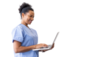 Smiling medical professional working on a laptop, showcasing expertise in healthcare while isolated on a transparent background