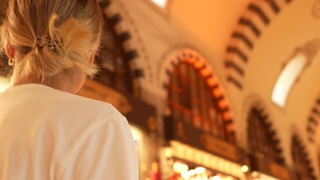 Girl walking in the city bazaar in Istanbul