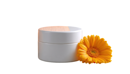 White cosmetic jar, topped with peach-colored label, beside a bright orange gerbera daisy