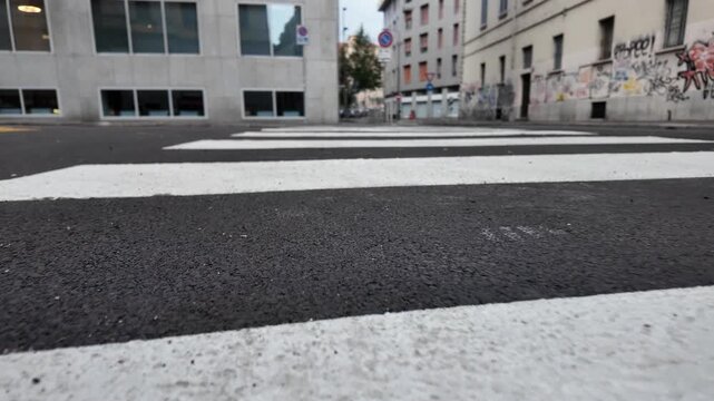 Top view of crossing the road in Milan, Italy