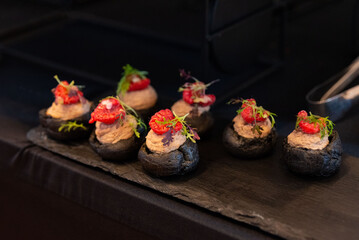 Gourmet appetizers on slate platter