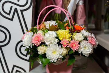 Colorful floral arrangement in basket