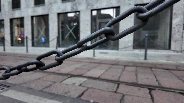 Creepy chain drags across stone floor