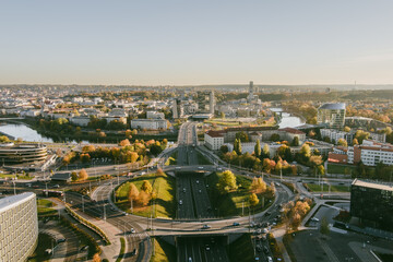 Obraz premium Beautiful Vilnius city panorama in autumn with orange and yellow foliage. Fall city scenery in Vilnius, Lithuania