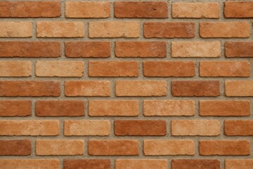 Fototapeta premium Close-up textured brick wall pattern with warm earthy tones for architectural backgrounds illustration