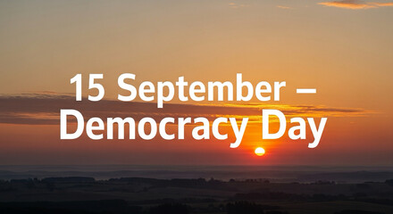 Peaceful sunrise background with large bold text “15 September – Democracy Day”.