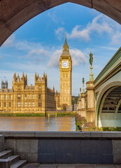 Fototapeta premium Big Ben with Houses of Parliament seen through Westminster bridge arch, London, UK