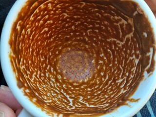 Fototapeta premium Turkish Coffee Cup with Fortune Reading Coffee Grounds Pattern