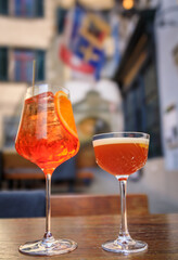 An effervescent spritz cocktail and a cocktail with foam in Zurich, Switzerland