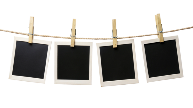 Four blank instant photo frames hanging on a rope