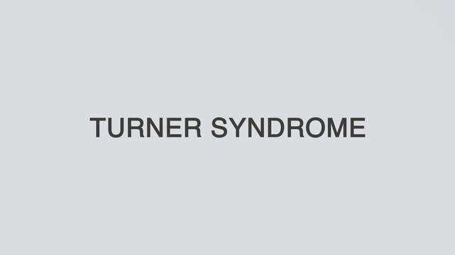 Turner syndrome concept word hand holding stethoscope on white background for genetic monitoring, diagnosis, treatment, prevention, wellness, and chromosomal disorder awareness