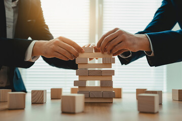 Business strategy teamwork building tower risk management game collaboration success planning together 100