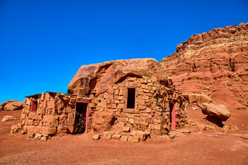 Stone House Built Into Red Rock Vermilion Cliffs Arizona Desert Midday Sky