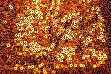 Bronze Sequined Fabric. Close-Up of Gold Sequins Fabric Texture. Close-Up of Gold Sequin Fabric. 