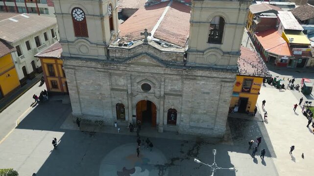 Main entrance of colonial Catholic church in Huancayo, Peru, 4K drone video.