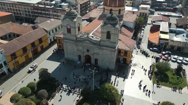 Aerial view of newlyweds and guests leaving church in Plaza de la Constituci&oacute;n, Huancayo.