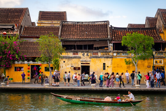 an old street and river in the city of Hội An, Vietnam