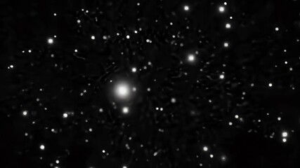 Abstract black background with scattered white highlights