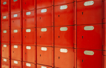 Fototapeta premium mailboxes red, storage security box equipment, lockers storage cabinet with keys,