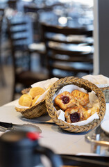 pastry mini raspberry crown danish, breakfast buffet catering baked goods, bread rolls , restaurant setting hotel.