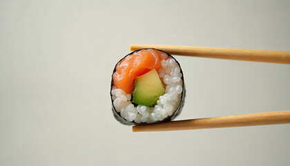 Sushi roll with fresh salmon, creamy avocado held by bamboo chopsticks. Japanese delicacy offers delightful combination of flavors, textures. Perfect for food blogs, culinary websites, restaurant