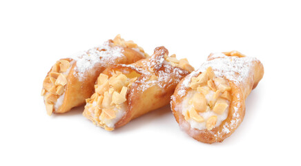 Delicious cannoli with ricotta cheese, peanuts and powdered sugar isolated on white