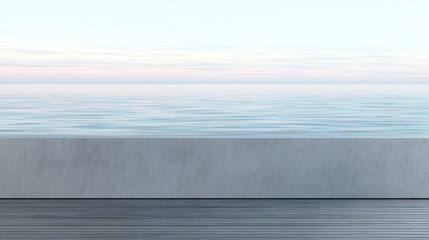 Fototapeta premium A serene seascape featuring calm water, a concrete wall, a wooden deck, and a softly colored sky, conveying tranquility and minimalism.