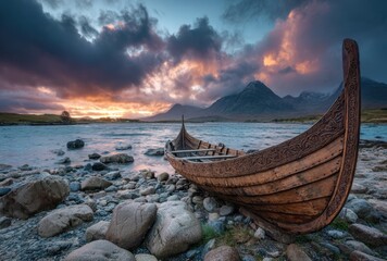 Serene coastal scene featuring a traditional wooden boat resting on rocky shoreline with dramatic sunset sky and distant mountains