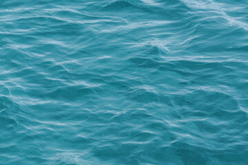 Light Blue Water with Soft Ripples and Transparency.
It can be used in projects related to hydration, health, well-being, or as a visual element in environmental awareness campaigns.