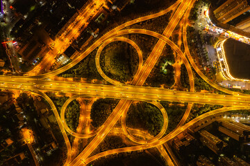 Wuhan china elevated highway network illuminates the night with flowing traffic.
