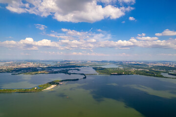 Wuhan china landscape water scene with clouds in the sky.