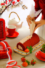 still life roll cake in red and white concept
