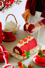 still life roll cake in red and white concept