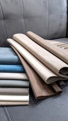 Fabric swatches stacked on a couch (1)