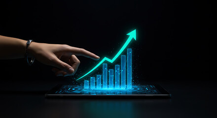 Digital Growth Chart: The image depicts a glowing digital chart on a tablet with a hand indicating upward growth, illustrating the concept of progress and financial increase.