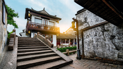Fototapeta premium Traditional Chinese Architecture with Stone Steps in Ancient Alley
