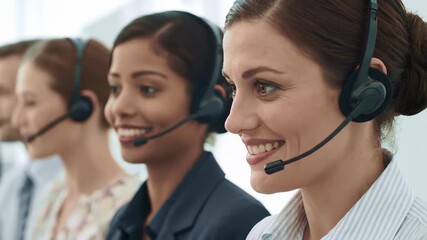 Diverse group of customer service representatives wearing headsets - Powered by Adobe