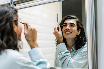 Everyday Vibe Hispanic Nonbinary Tutorial on Simple Blush and Mascara Application, Promoting Gender-Neutral Beauty Products, Inclusive Makeup, and Self-Expression Through Beauty in Casual Setting