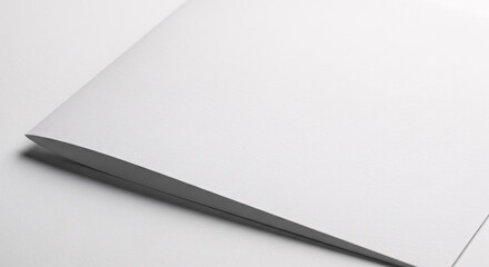 A close up shot showing a sharp black knife partially on a white surface in a studio setting view on transparent background
