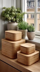 Stacked wooden boxes on windowsill