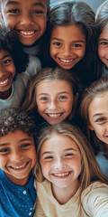 Fototapeta premium Overhead shot of a photograph of several diverse and fun school-aged children