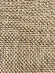 Woven fabric texture showcasing detailed patterns and neutral tones