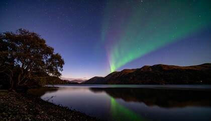 Nighttime aurora borealis over a lake (1)