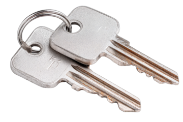 Two metal keys on a key ring, angled slightly