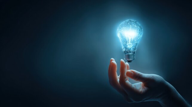 Illuminating Innovation: A hand delicately cradles a glowing lightbulb, symbolizing the birth of a brilliant idea. The image evokes a sense of innovation and inspiration. 
