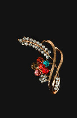 Indian imitation jewelary hairpin isolated on black background 
