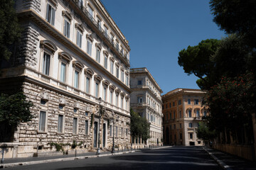 ancient buildings of rome standing majestically against clear blue sky highlighted by ultrabright sunlight